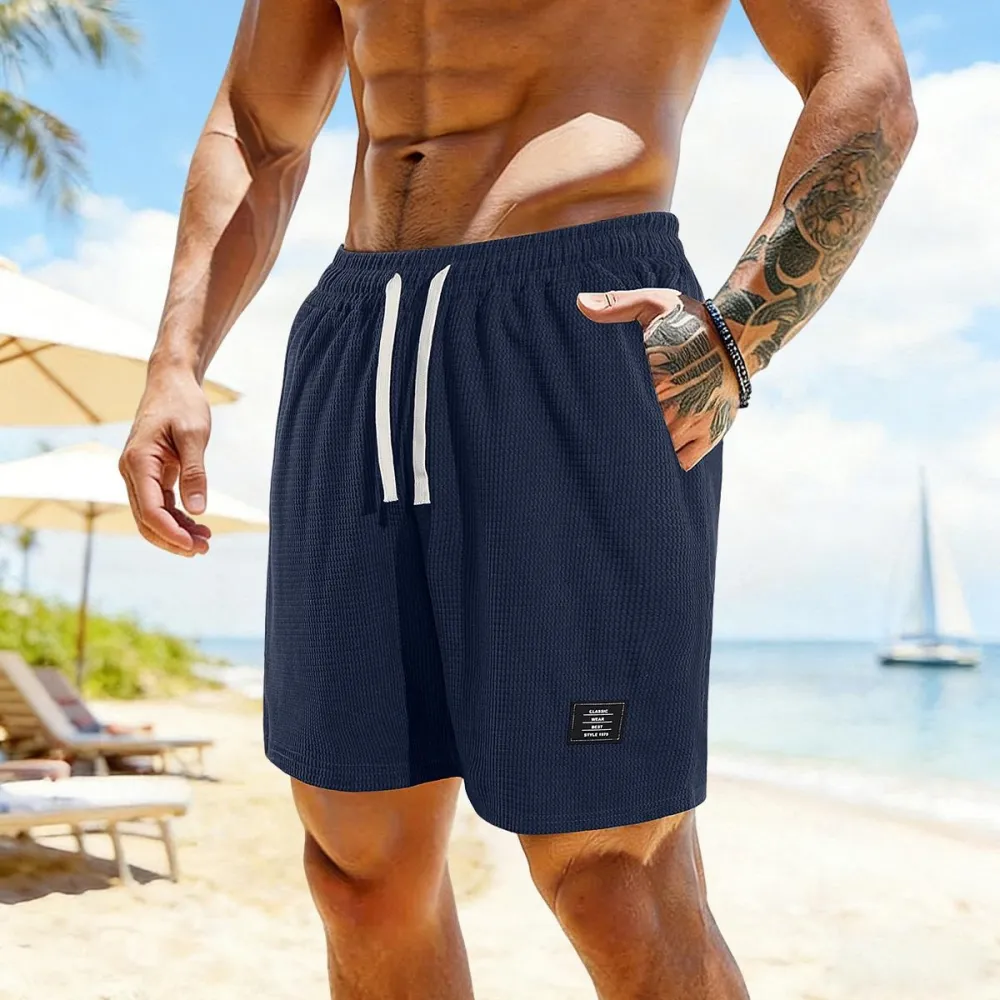solid color, men’s casual shorts with side pockets and a drawstring elastic waistband