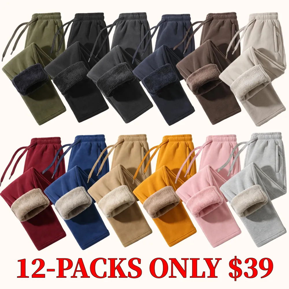 Unisex fleece-lined sweatpants with brushed interior, flat front design, zippered pockets, and a relaxed fit