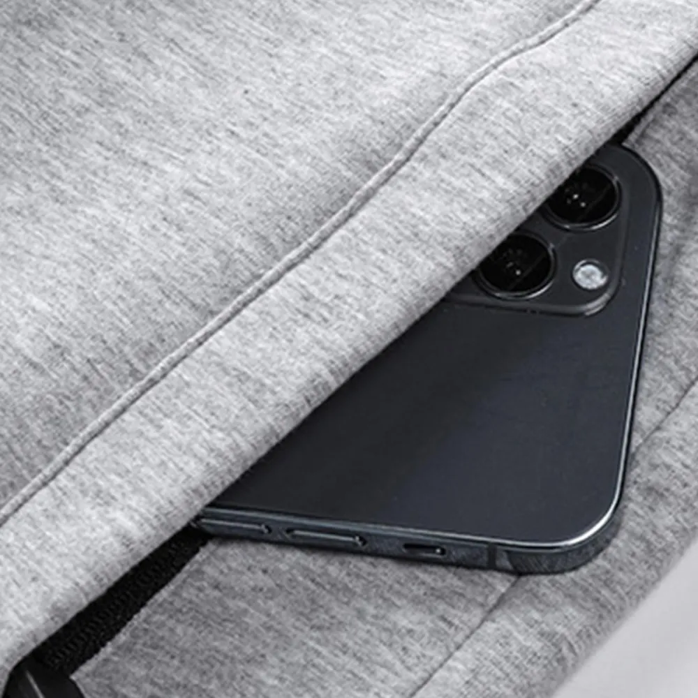 Men’s casual athletic shorts, available in four colors, made from breathable fabric with a zipper design—perfect for summer beach trips, outings