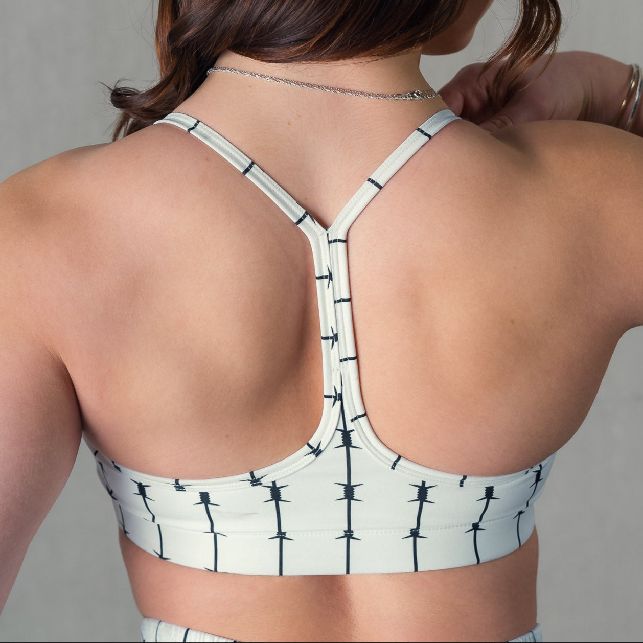 BARBWIRE SPORTS BRA - WHITE / RED