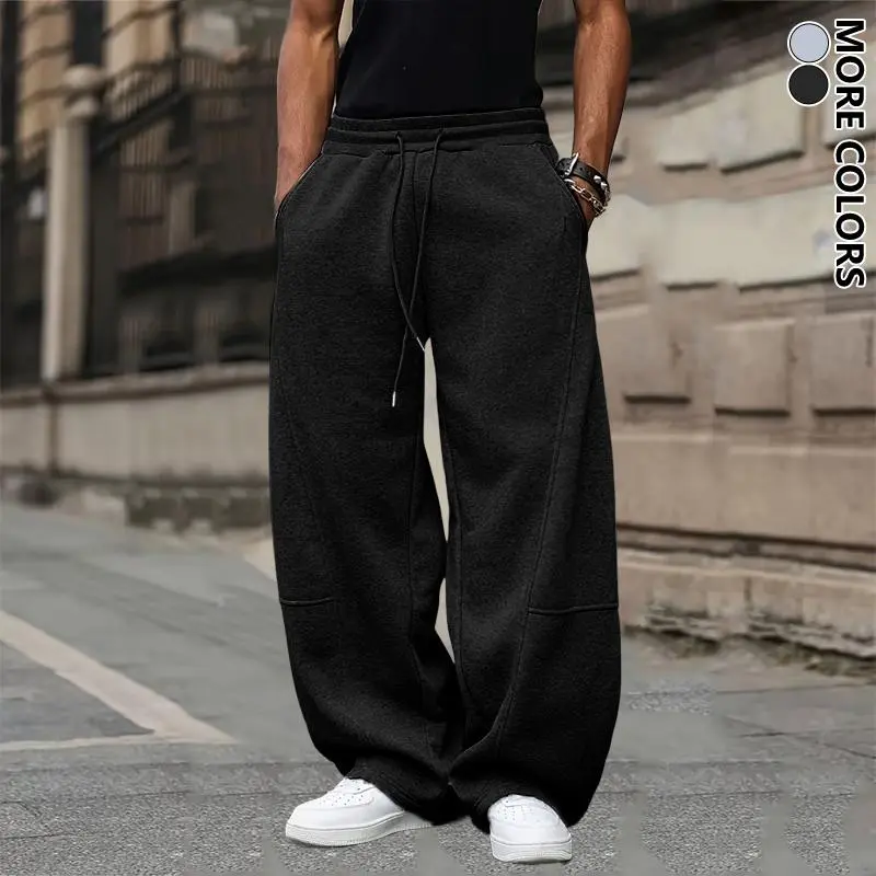Men's unisex wide-leg sweatpants, loose and breathable polyester casual trousers with drawstring design, and solid color paneling