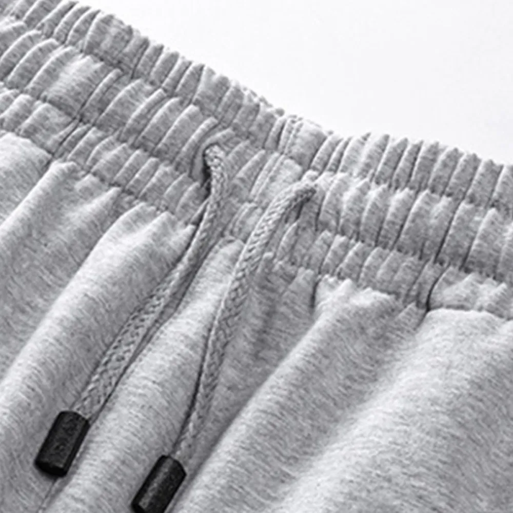 Men’s casual athletic shorts, available in four colors, made from breathable fabric with a zipper design—perfect for summer beach trips, outings