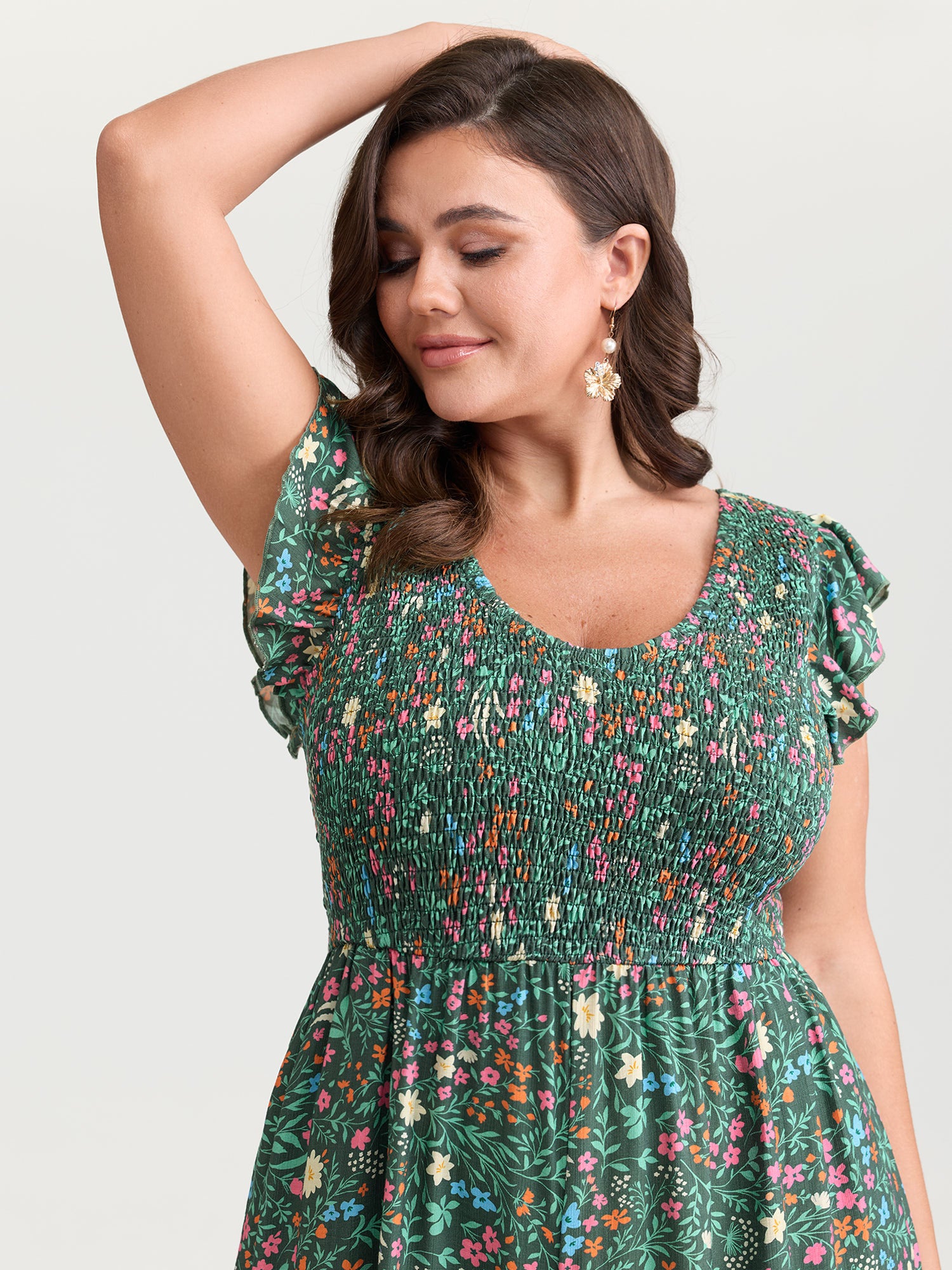 Breezy Floral Print Flutter Sleeve Jumpsuit