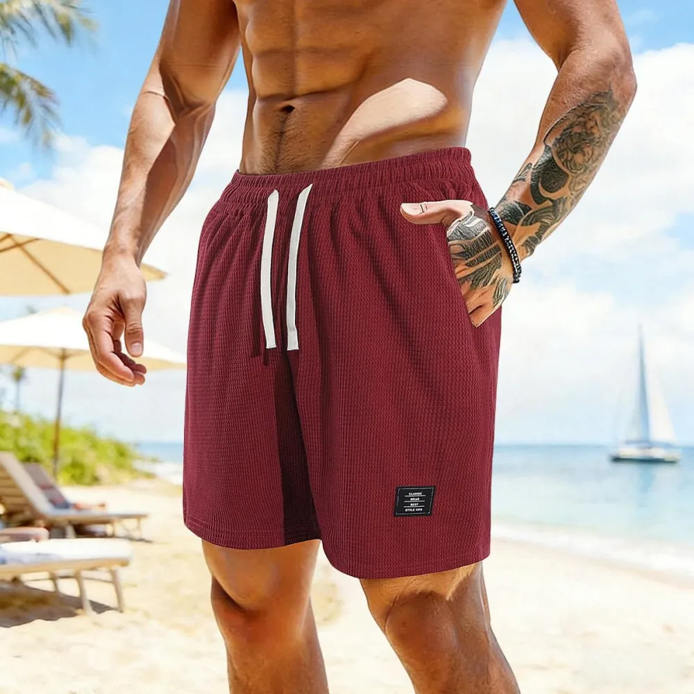 solid color, men’s casual shorts with side pockets and a drawstring elastic waistband