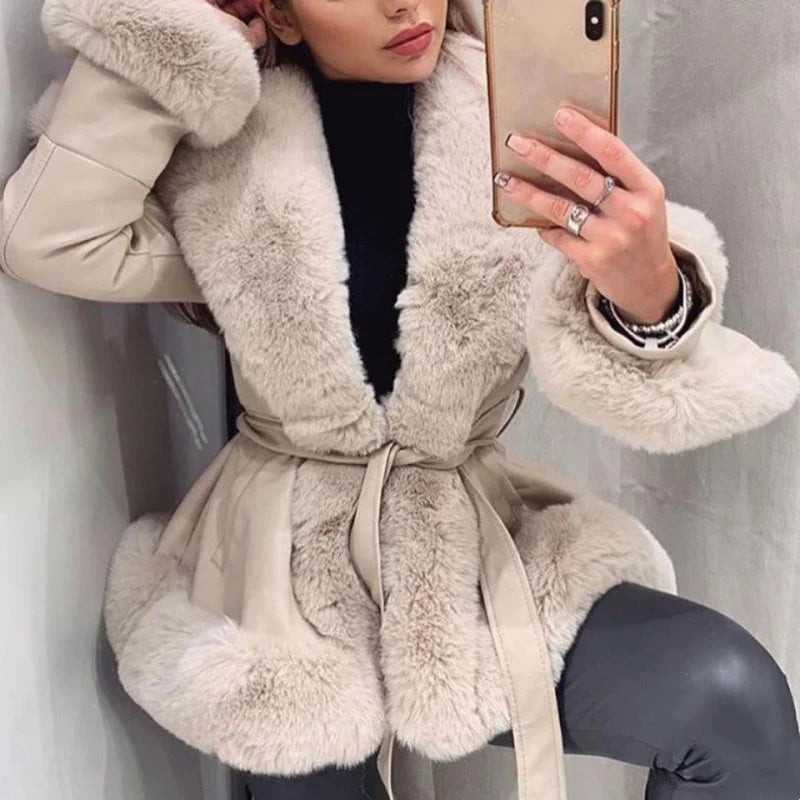 Women's coat made of faux leather with faux fur collar