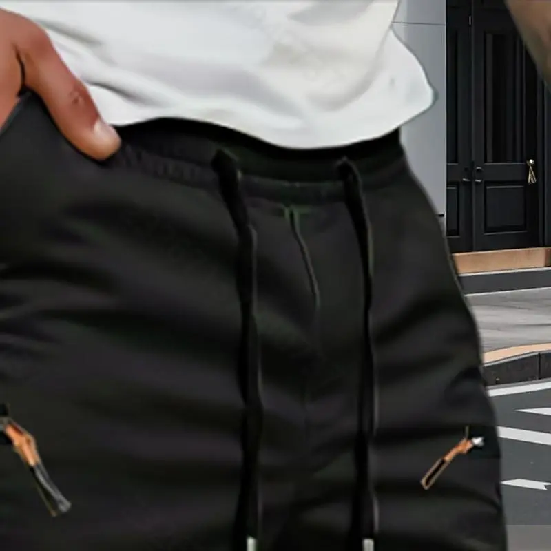 Men's work pants with tapered legs and rolled-up cuffs