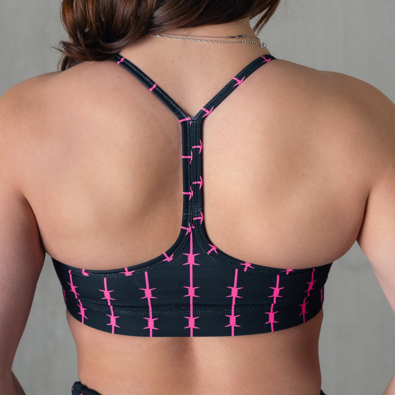 BARBWIRE SPORTS BRA - BLACK / PINK