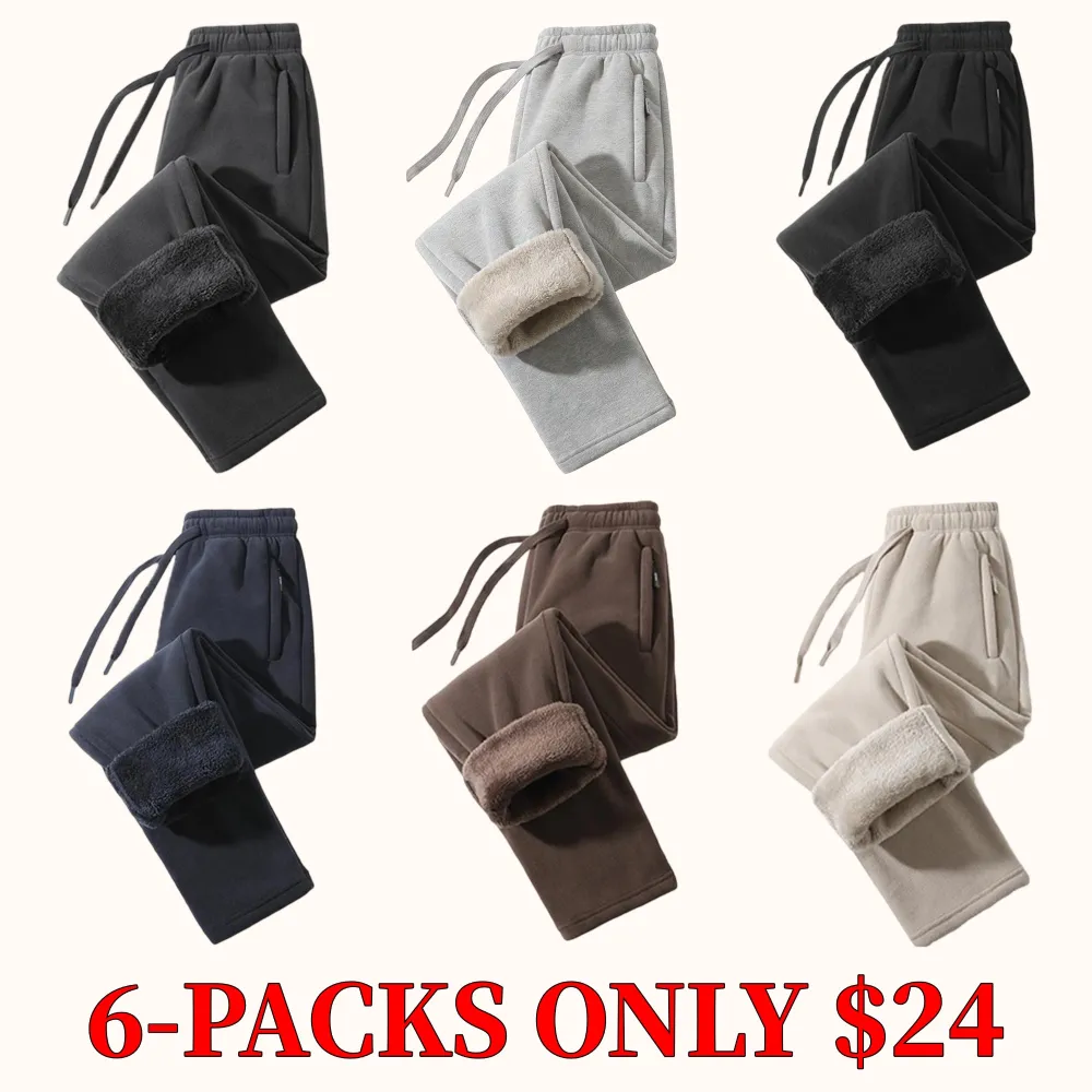 Unisex fleece-lined sweatpants with brushed interior, flat front design, zippered pockets, and a relaxed fit