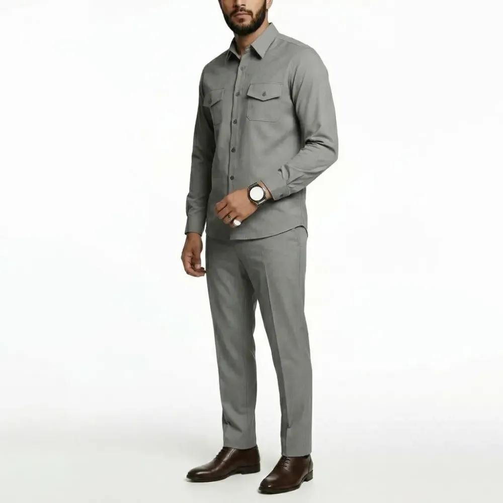 A minimalist men's business suit includes a long-sleeved shirt and straight-leg trousers.