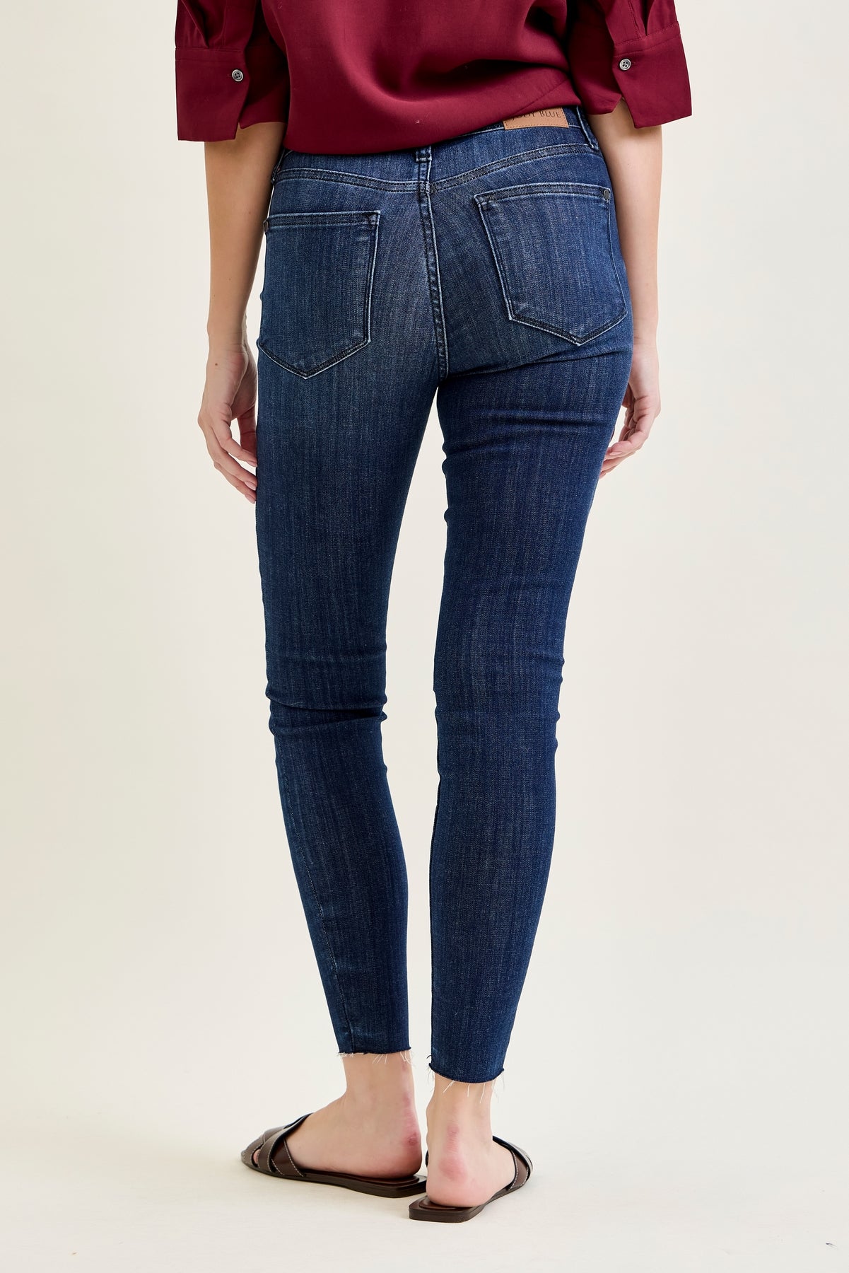Kinsley Edgy Mid Rise Skinnies with a Raw Twist