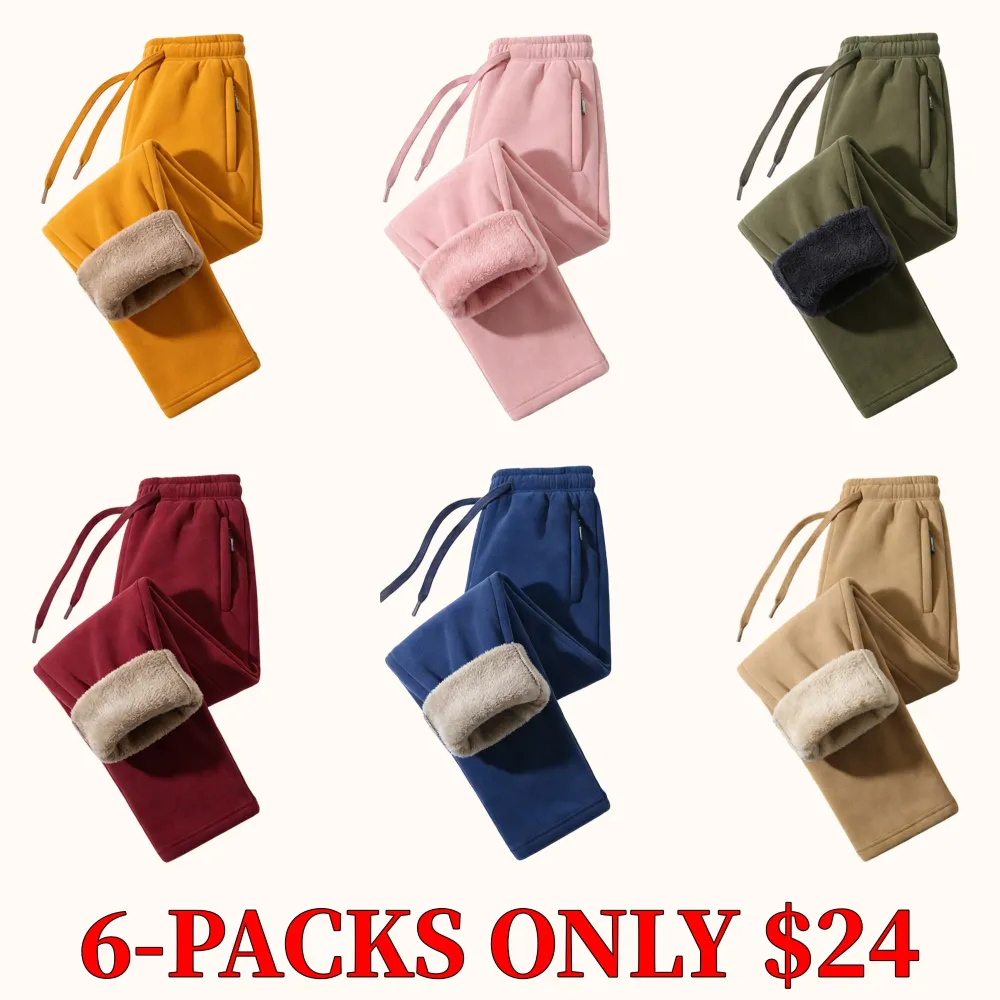 Unisex fleece-lined sweatpants with brushed interior, flat front design, zippered pockets, and a relaxed fit