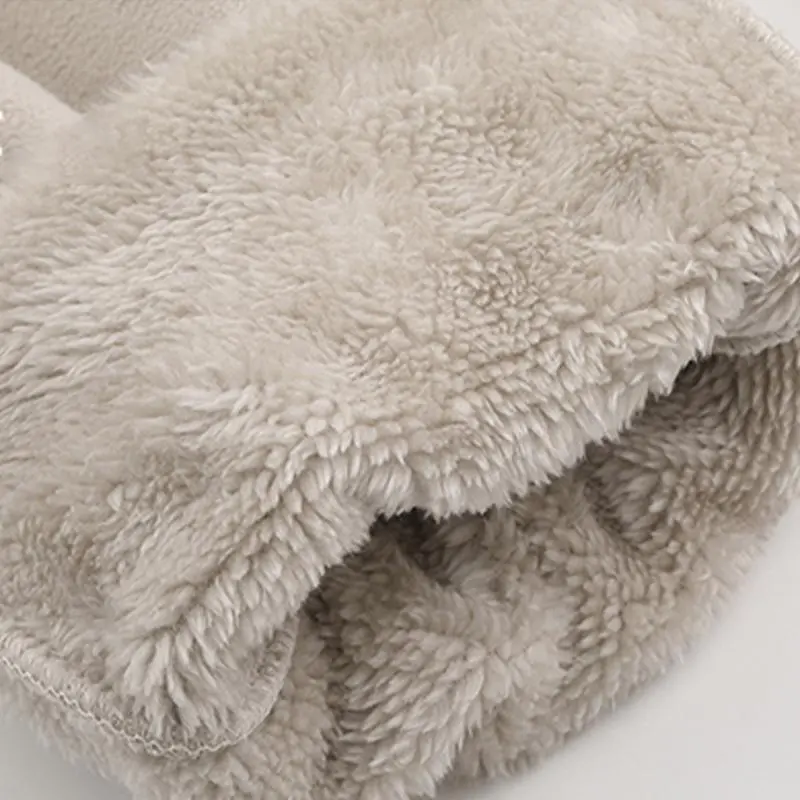 Unisex fleece-lined sweatpants with brushed interior, flat front design, zippered pockets, and a relaxed fit