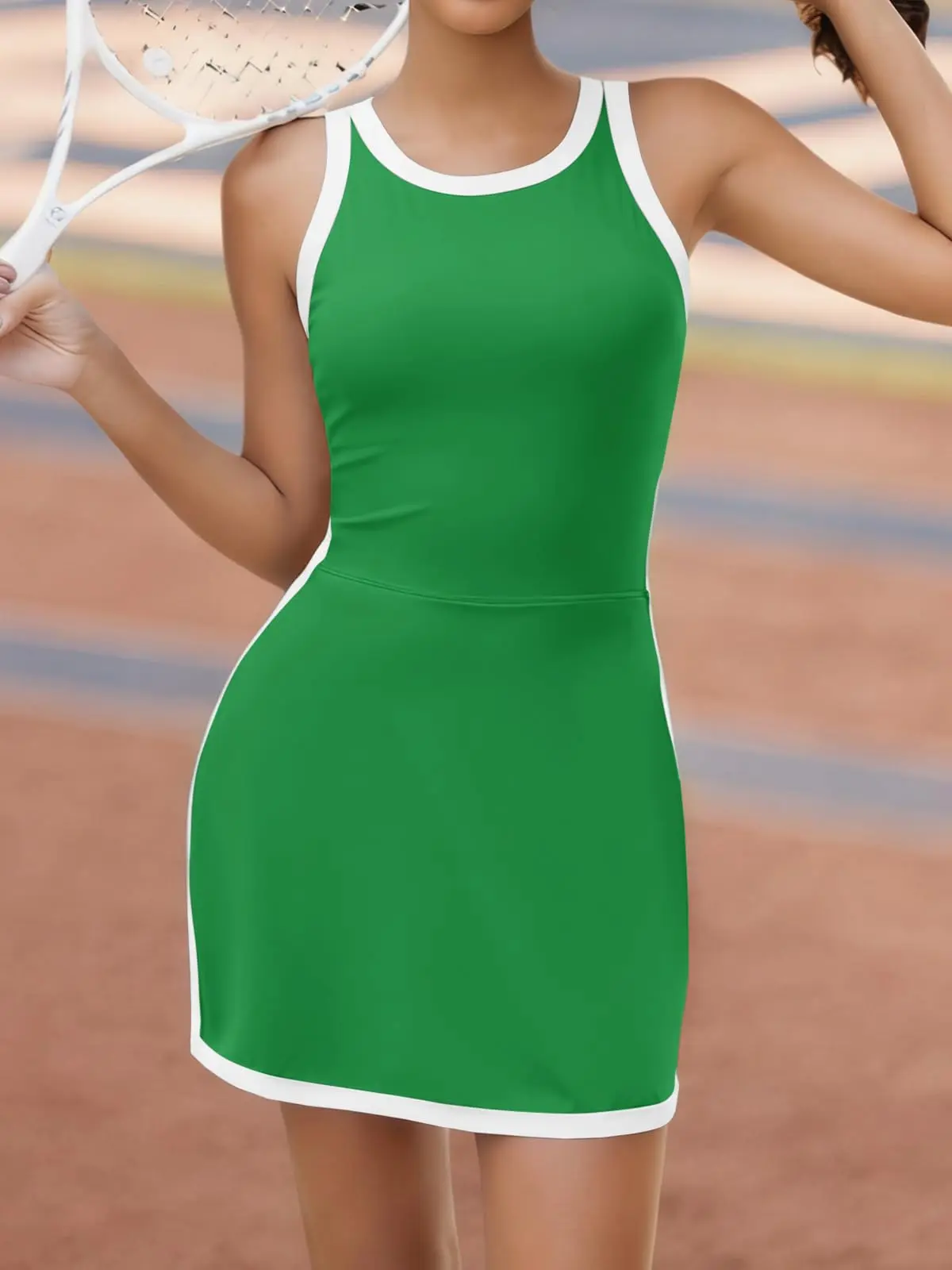 women's sleeveless halter tennis dress with white piping, open back design, and stylish cutout details at the back, perfect for sports or casual wear